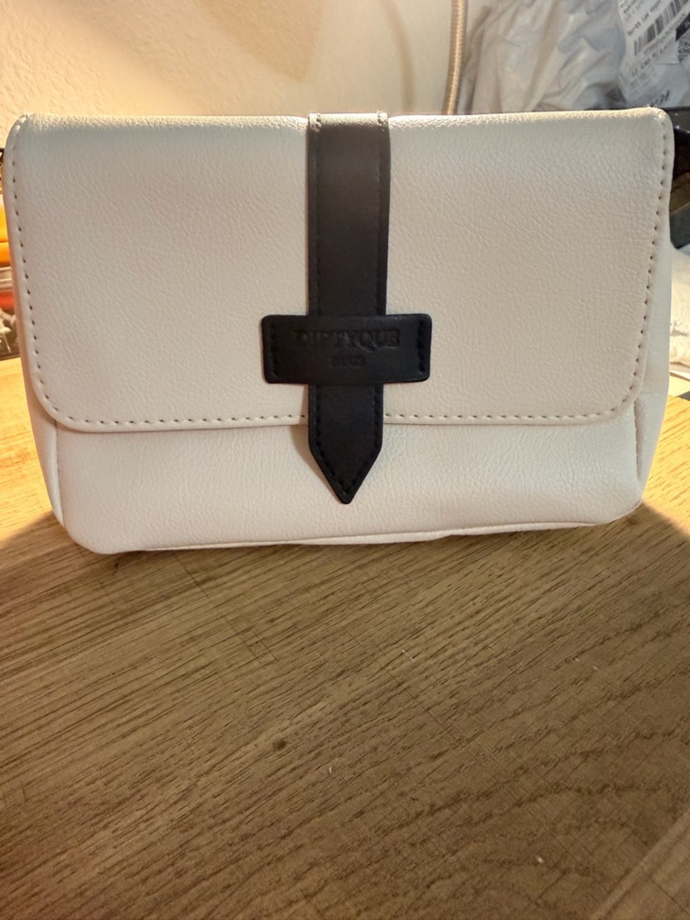 Compact White Crossbody Bag with Black Strap